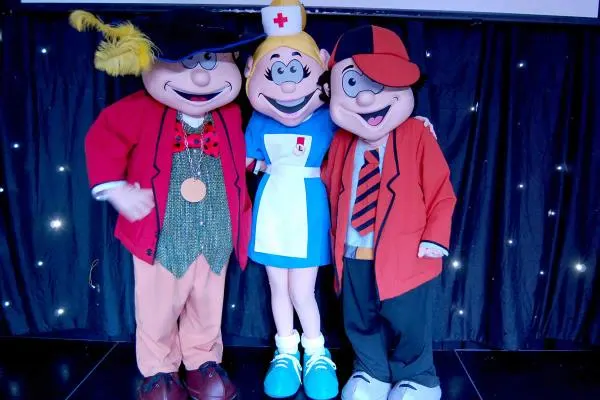 Mayor Tumbledown, Nurse Milly and Naughty Norris on the Happy Town stage